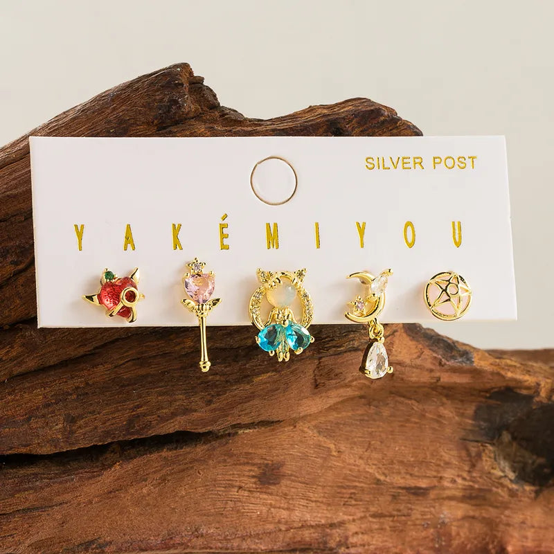 Set de aretes Sailor Moon baño de oro 14k