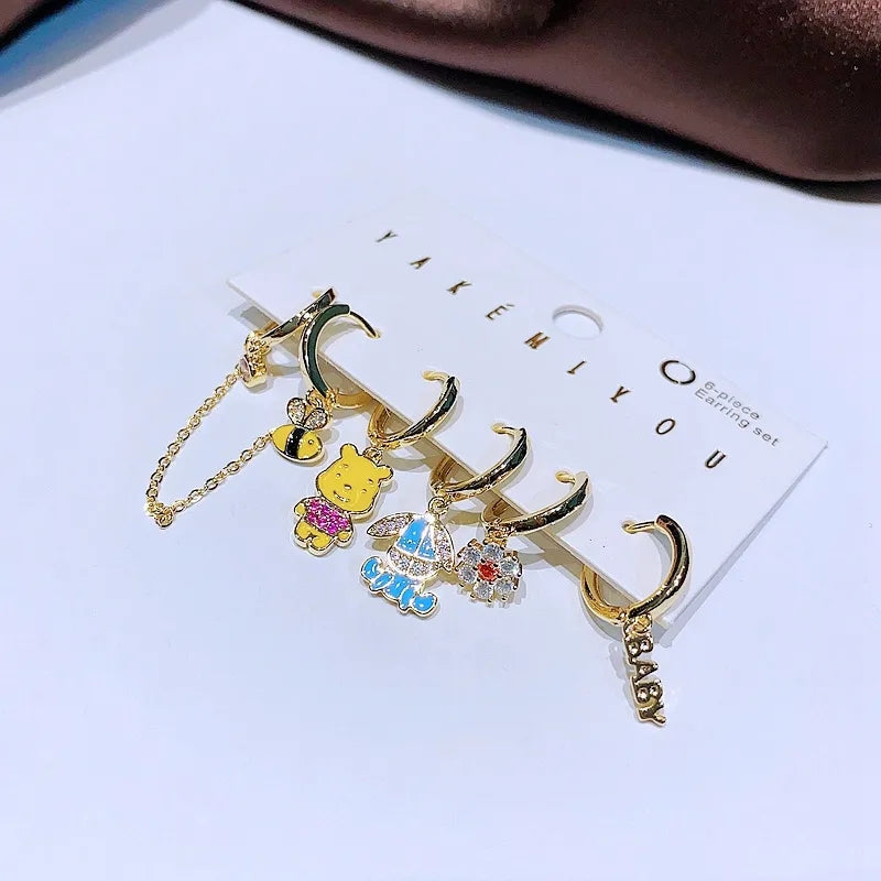 Set de 6 aretes Winnie Pooh baño de oro 14k
