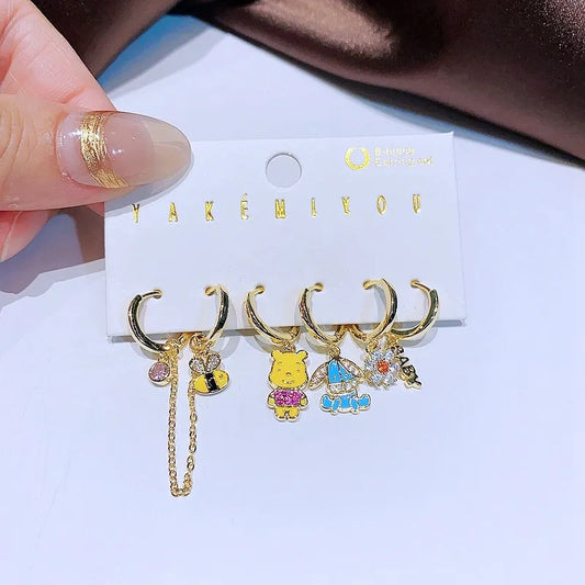 Set de 6 aretes Winnie Pooh baño de oro 14k