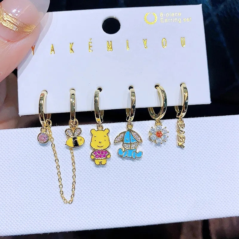 Set de 6 aretes Winnie Pooh baño de oro 14k