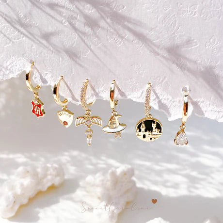 Set de 6 aretes Harry Potter baño de oro 14k