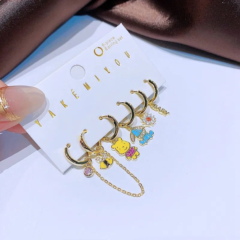 Set de 6 aretes Winnie Pooh baño de oro 14k