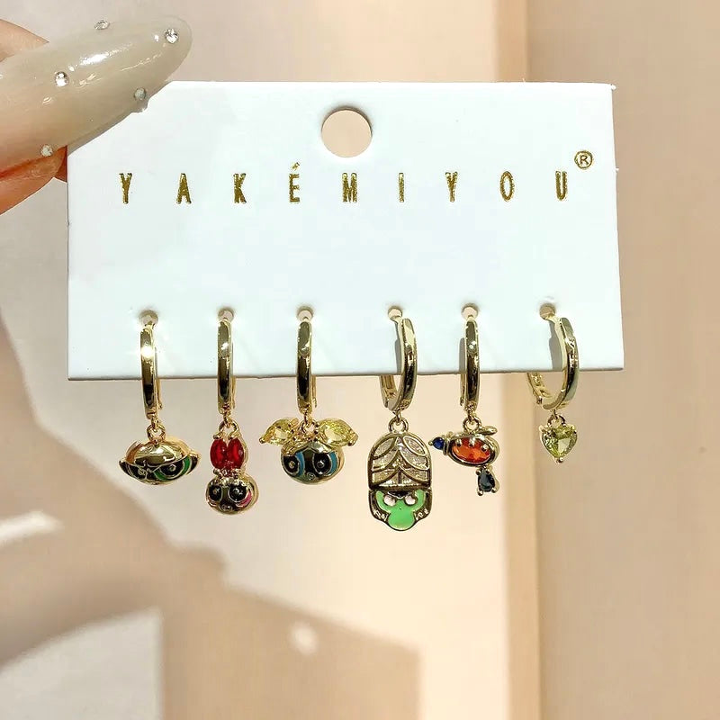Set de aretes baño de oro 14k de las Chicas Superpoderosas