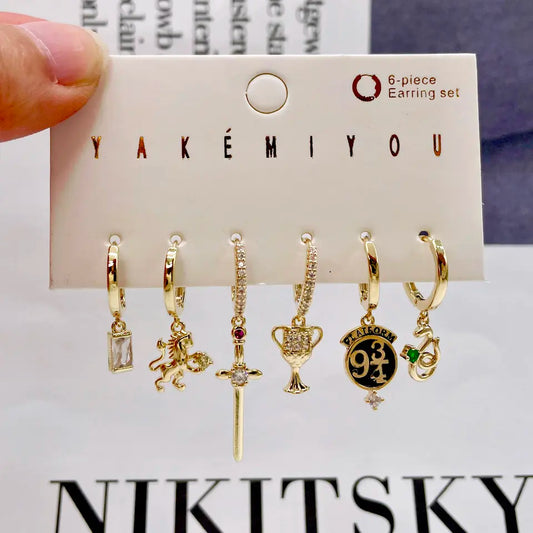 Set de 6 aretes Harry Potter baño de oro 14k