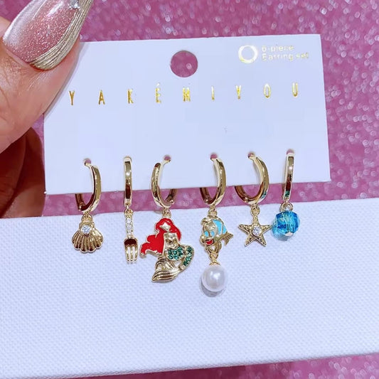 Set de 6 aretes de La Sirenita baño de oro 14k