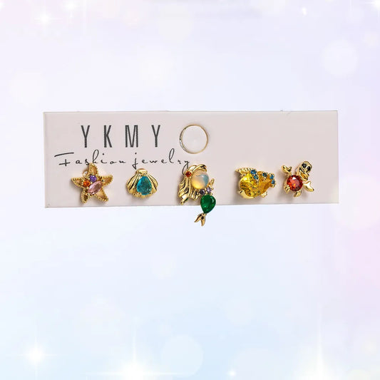 Set de 5 aretes de La Sirenita baño de oro 14k