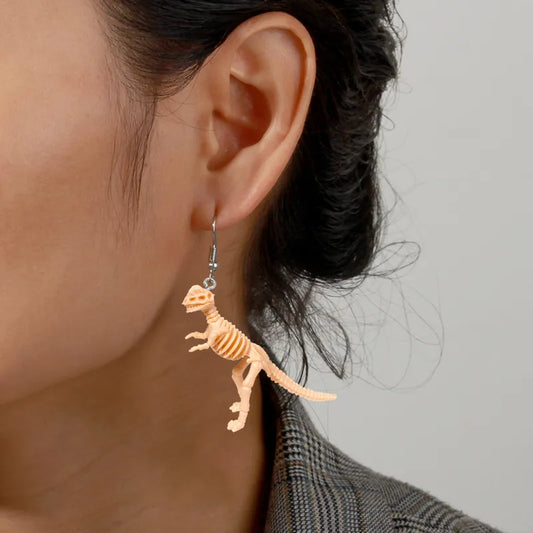 Par de aretes dinosaurios