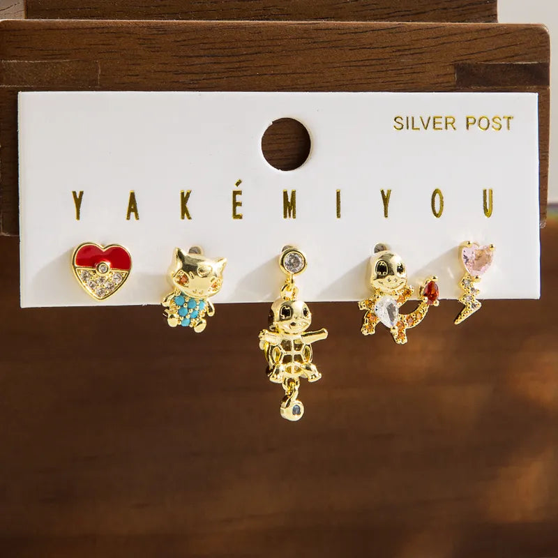 Set de 5 aretes Pokémon baño de oro 14k