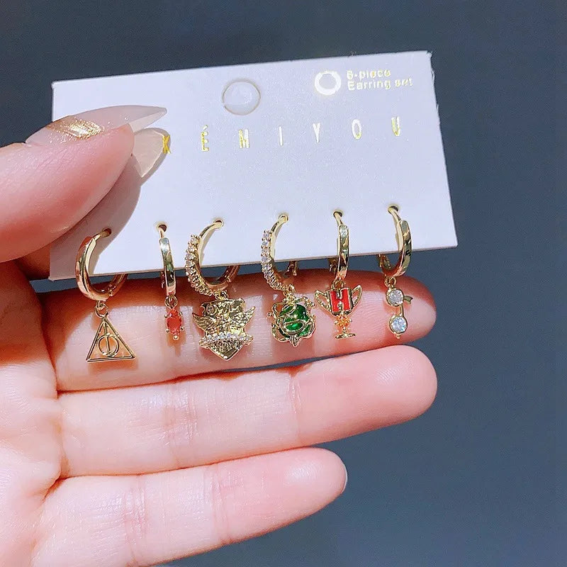 Set de 6 aretes Harry Potter baño de oro 14k