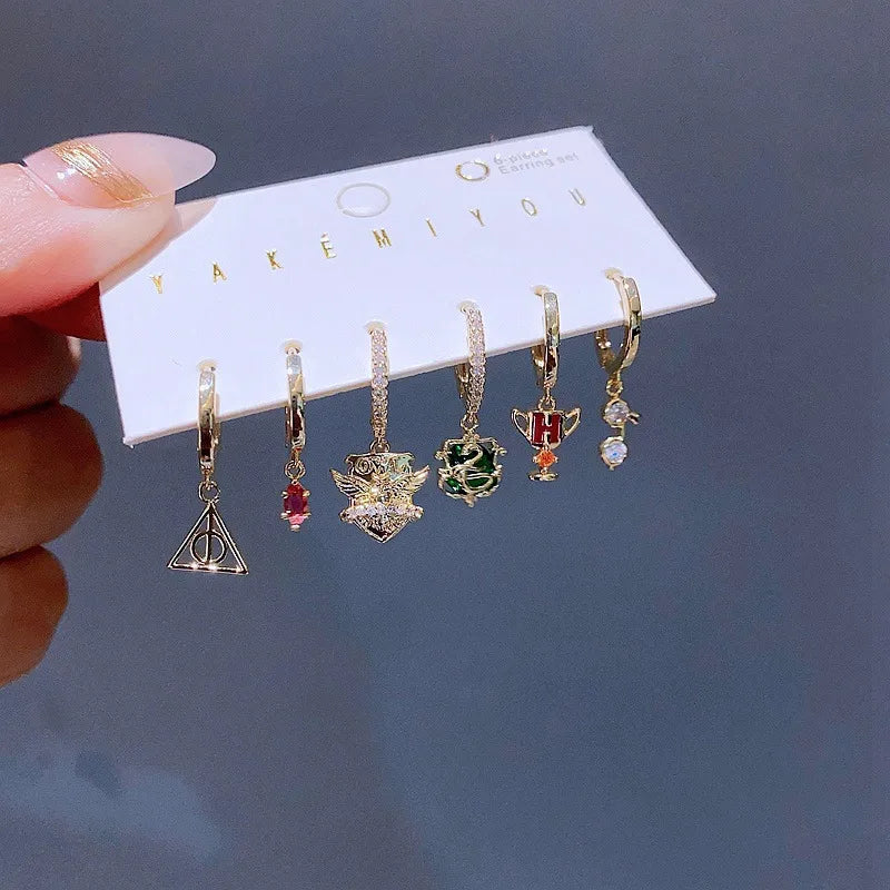 Set de 6 aretes Harry Potter baño de oro 14k