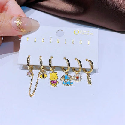 Set de 6 aretes Winnie Pooh baño de oro 14k