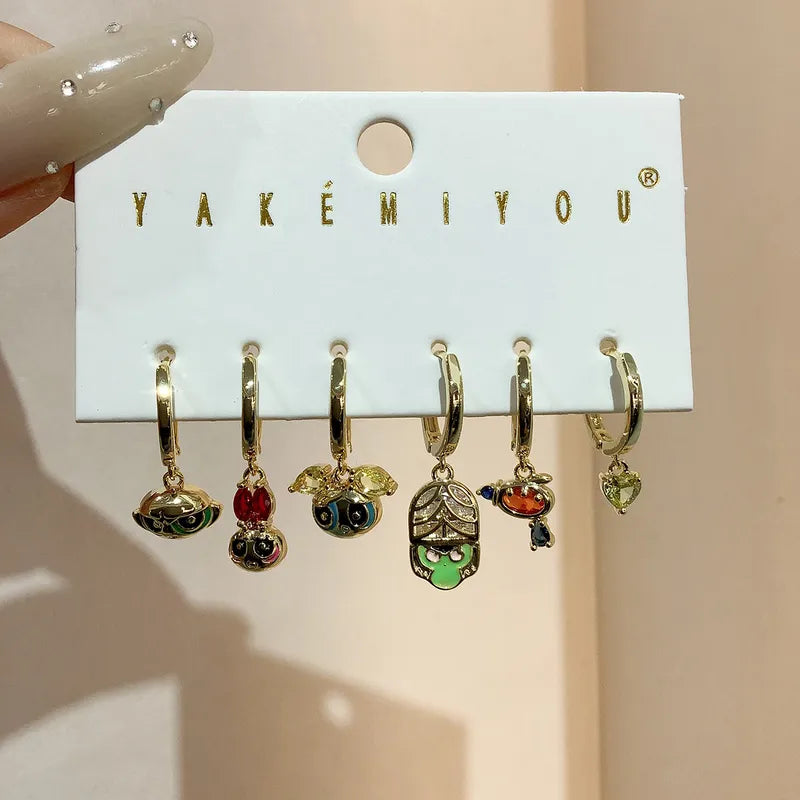 Set de aretes baño de oro 14k de las Chicas Superpoderosas