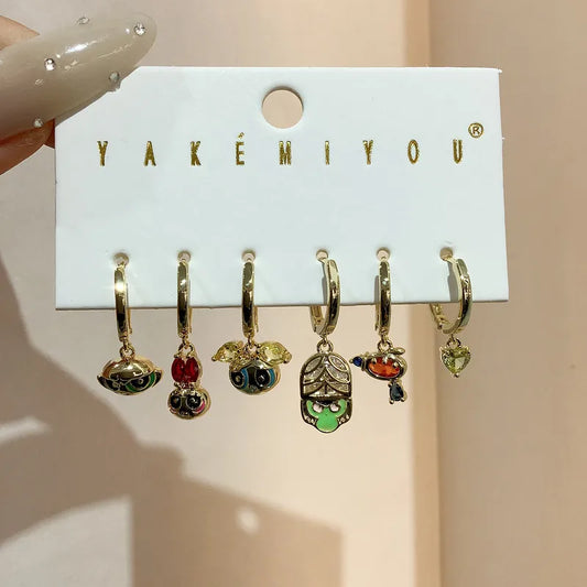 Set de aretes baño de oro 14k de las Chicas Superpoderosas