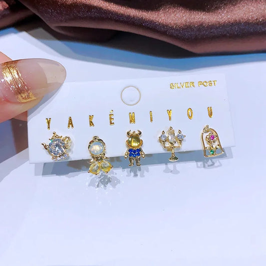 Set de 5 aretes de la Bella y la Bestia baño de oro 14k