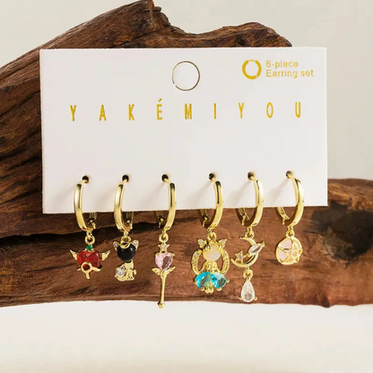 Set de aretes Sailor Moon baño de oro 14k