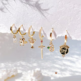 Set de 6 aretes Harry Potter baño de oro 14k