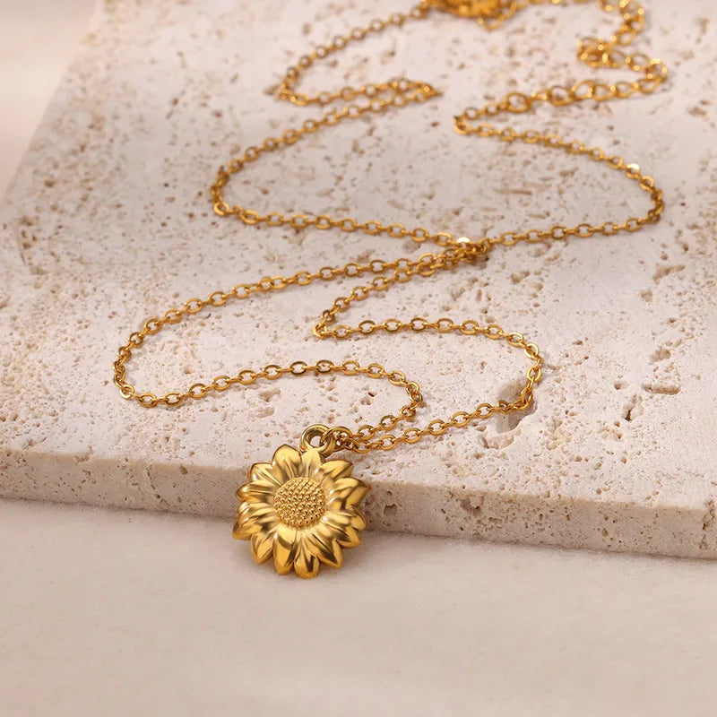 Set de collar y anillo de girasol en acero inoxidable