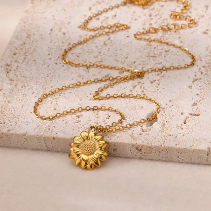 Set de collar y anillo de girasol en acero inoxidable