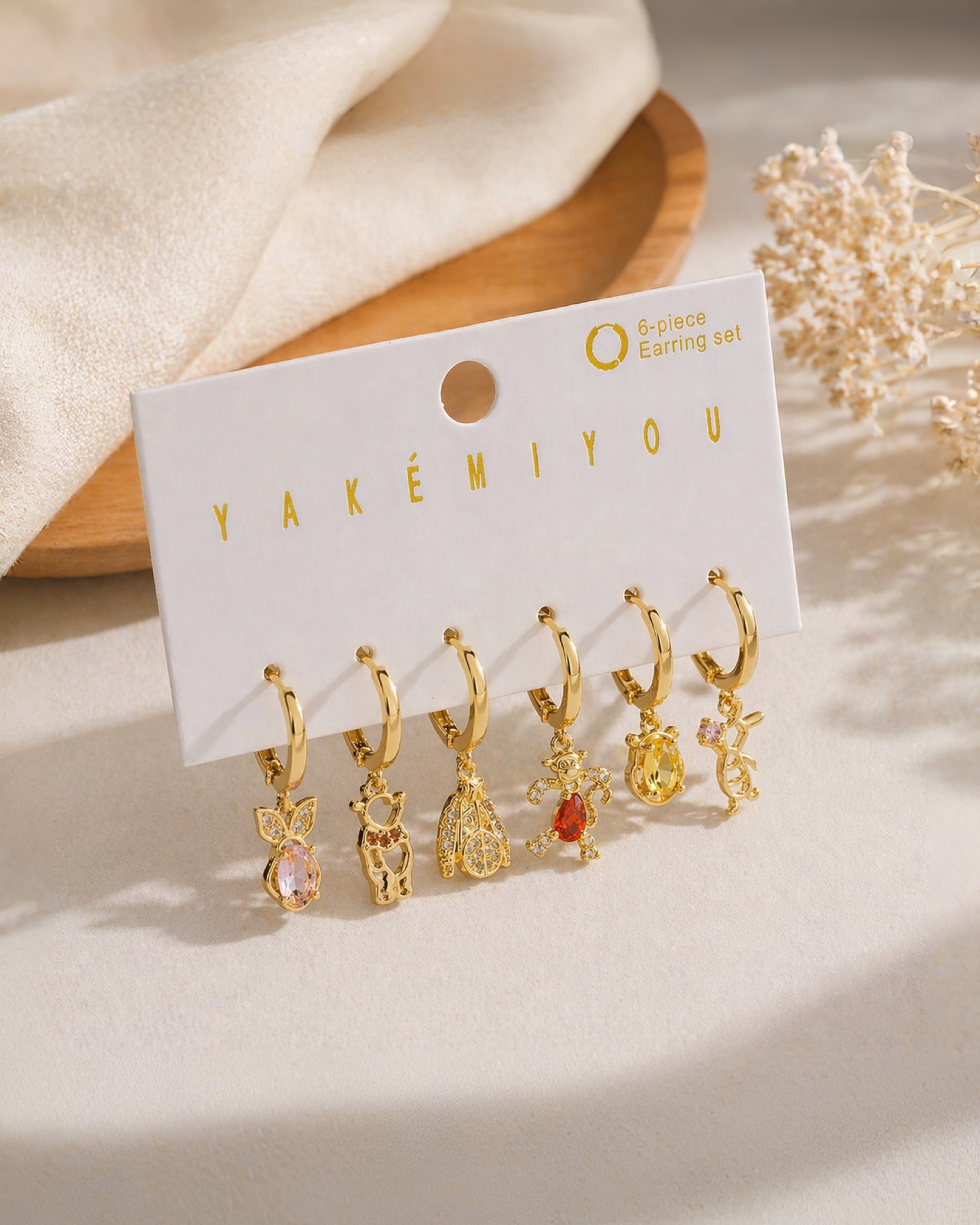 Set de 6 aretes Winnie Pooh baño de oro 14k