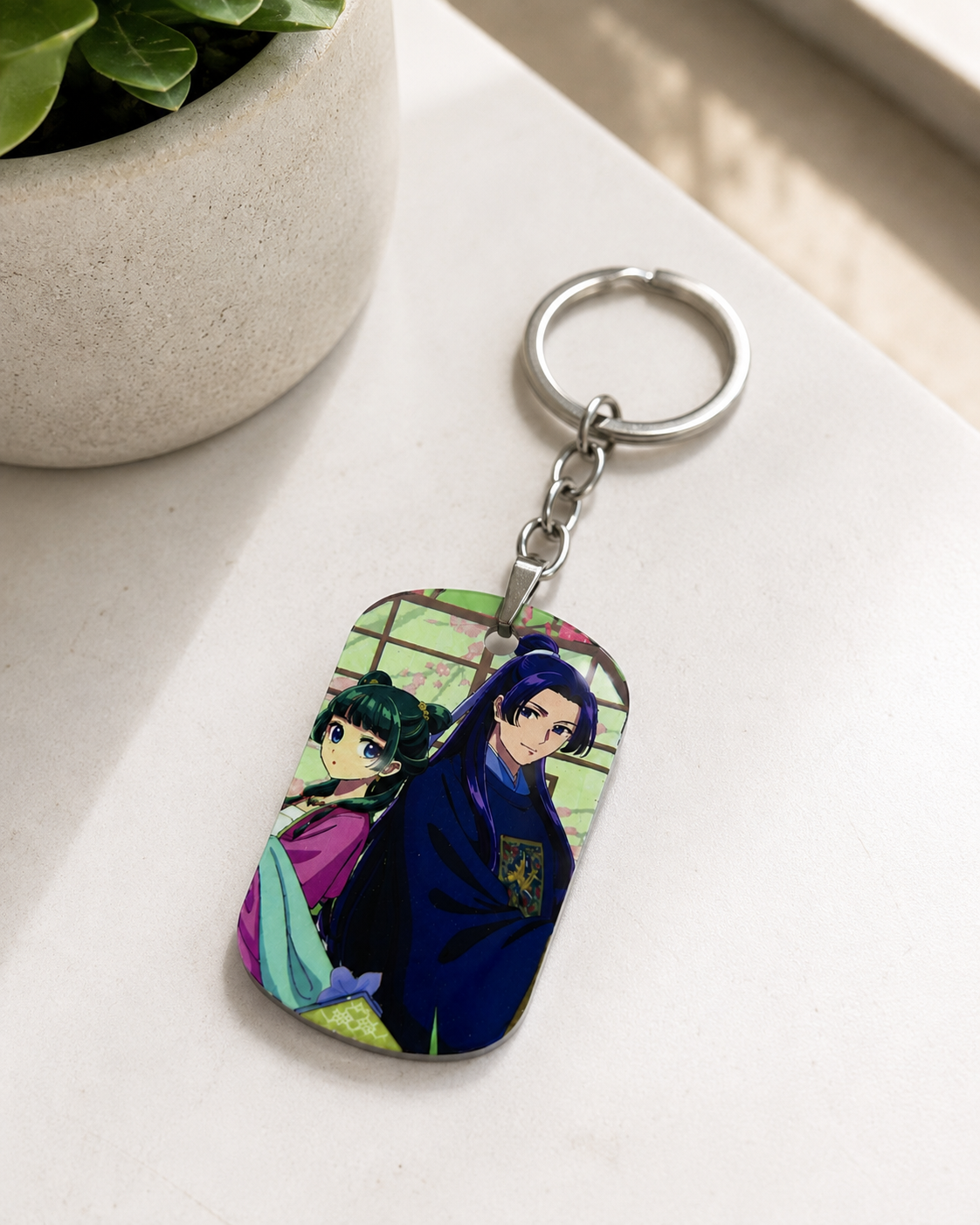 Llavero metálico de Los diarios de la Boticaria