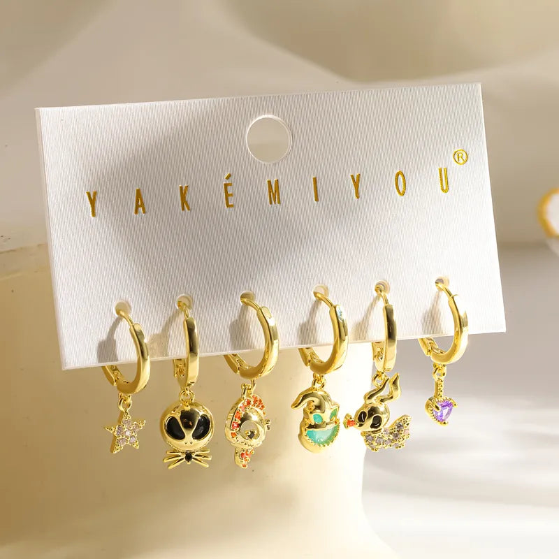 Set de aretes Nightmare Before Christmas baño de oro 14k
