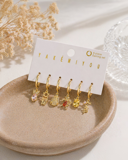 Set de 6 aretes Winnie Pooh baño de oro 14k