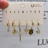 Set de 6 aretes Harry Potter baño de oro 14k