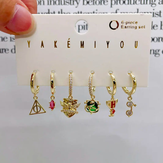 Set de 6 aretes Harry Potter baño de oro 14k