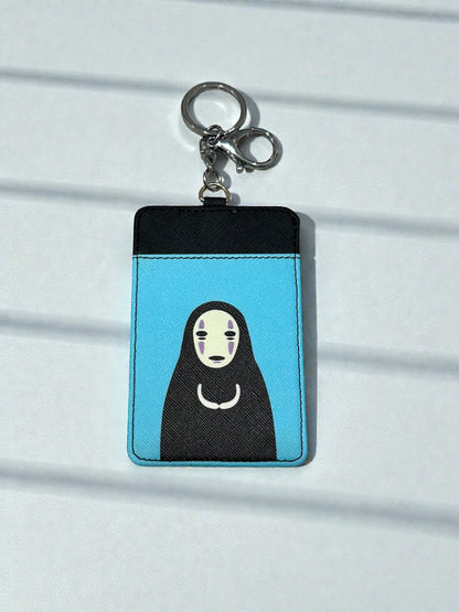Tarjetero y llavero No Face
