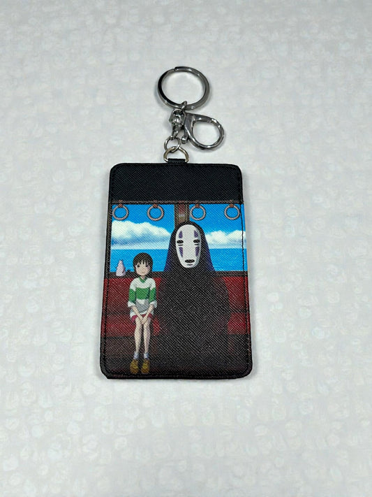 Tarjetero y llavero No Face