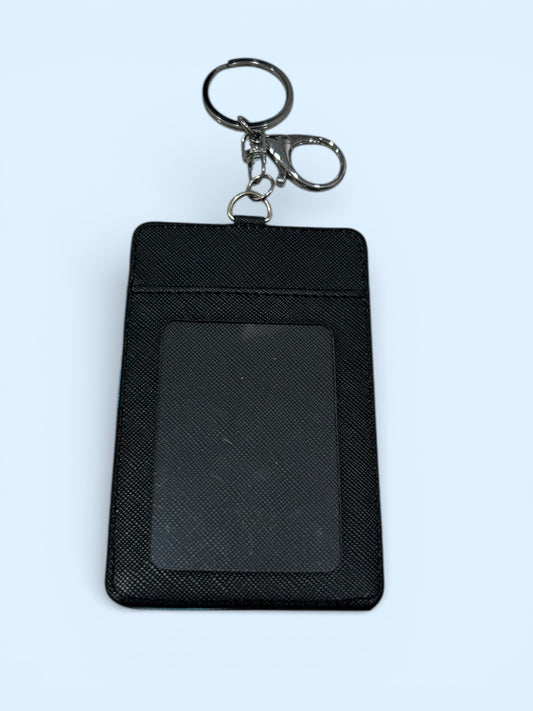 Tarjetero y llavero No Face