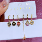 Set de 6 aretes Spiderman baño de oro 14k