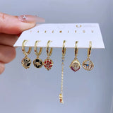 Set de 6 aretes Spiderman baño de oro 14k