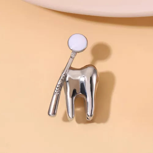 Broche Dentista