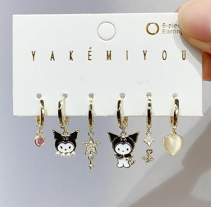 Set de 6 aretes Kuromi baño de oro 14k