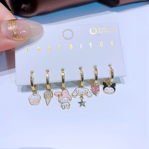 Set de 6 aretes Sanrio baño de oro 14k