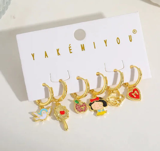 Set de 6 aretes Blanca Nieves baño de oro 14k