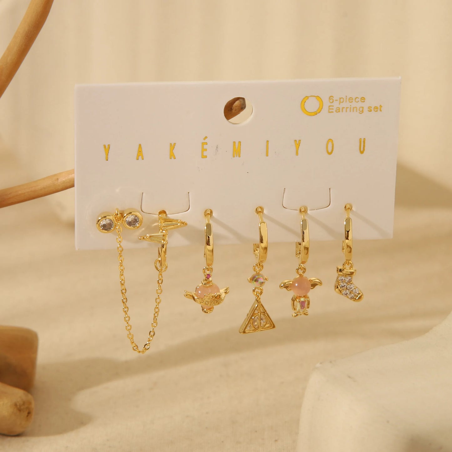 Set de aretes Harry Potter baño de oro 14k