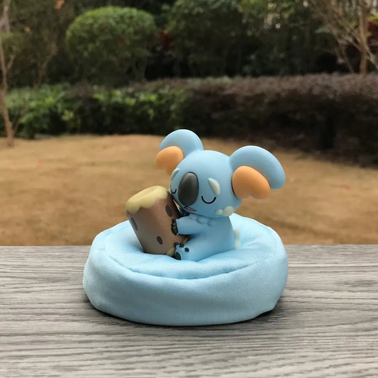 Figura Komala durmiendo