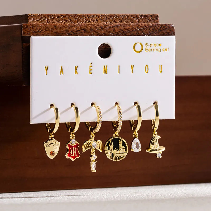 Set de 6 aretes Harry Potter baño de oro 14k