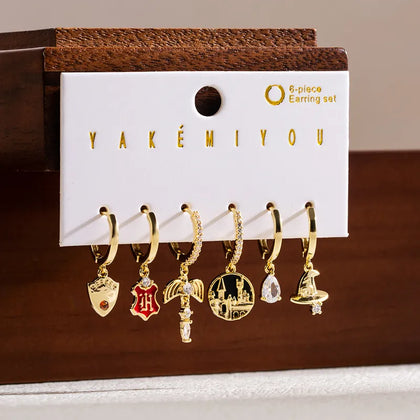 Set de 6 aretes Harry Potter baño de oro 14k