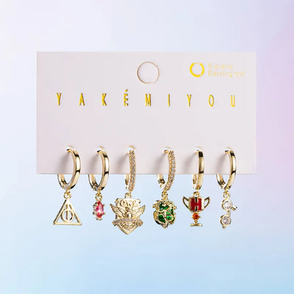 Set de 6 aretes Harry Potter baño de oro 14k
