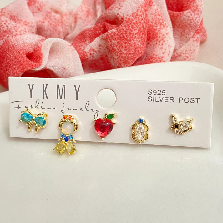 Set de 5 aretes Blanca Nieves baño de oro 14k