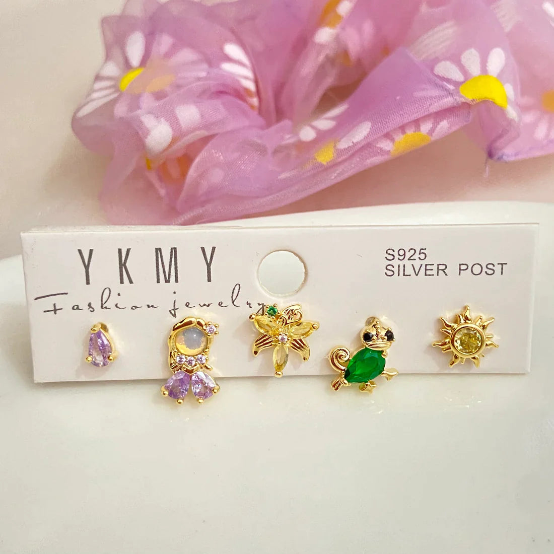 Set de 5 aretes de Rapunzel baño de oro 14k