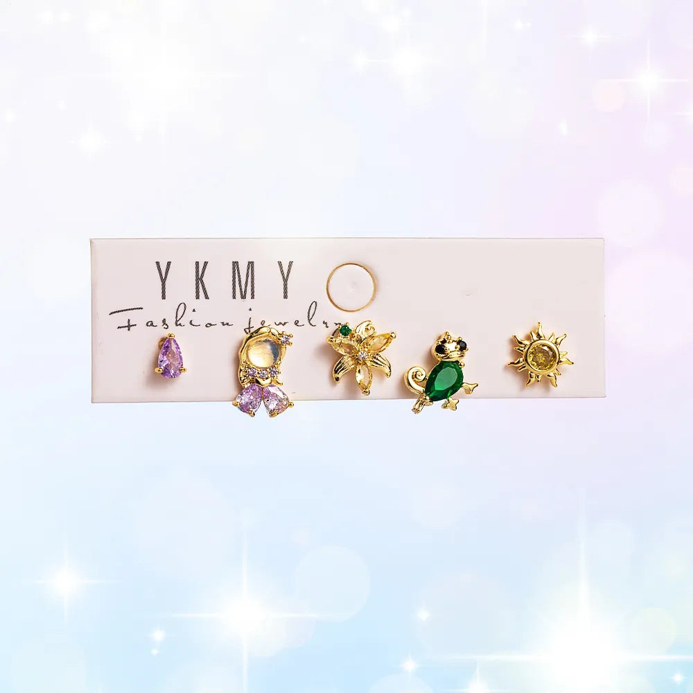 Set de 5 aretes de Rapunzel baño de oro 14k